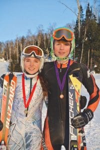 Above: Reilly Wahlers and Will Lamb at the Section 7 Alpine ski meet at Giants Ridge on February 4. They advanced to State. Left: The sections team members were (L-R, front) Morgan Weyrens Welch, Megan Lehto, Alyssa Martinson, Ava McMillan, Reilly Wahlers and Sela Backstrom. (L-R, back) Jack Viren, Joe Borud, Charlie Lawler, Logan Backstrom, Will Lamb, and Damian Zimmer.