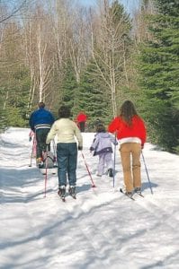 The Norpine Trail System is a 58K system that is enjoyed by young and old, like this family group. Community members are invited to join the Norpine Ski Club on Saturday, Feb. 22 for the Norpine “Lopper,” a day of work and play on the trails.