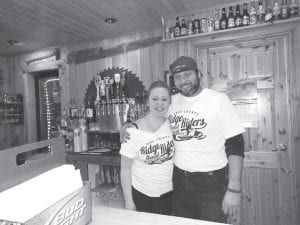 The Logger’s Lounge at Hungry Jack Lodge was packed, keeping Mary Edson and Forrest Parsons busy throughout the Fun Run.