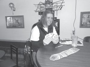 Fun Run Gal Samantha was standing by at Windigo Lodge with cards for the Poker Run players.