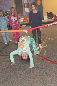 How low can you go? Girls had a great time playing Twister and Limbo! This young lady had an interesting Limbo style.