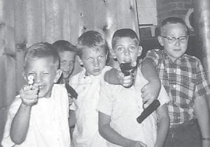 These young men were having a great time with their toy guns. The picture was likely taken in the summer of 1968 by Clint Helmerson of his friends (L-R) Greg Hanson, Monte Lampel, Aaron Anderson, Mike Vanderzee, and John Mianowski.