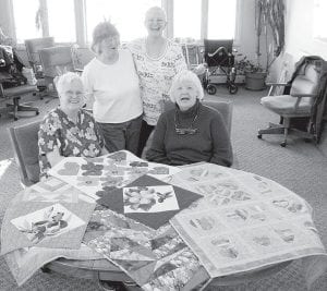 Top: The Pincushion Quilters meet at the Cook County Senior Center at 10:00 a.m. on the first and fourth Thursdays each month. The meetings are open to the public. Stop in and join them for some fun, sharing ideas, projects and learning of the fun hobby of quilting. Above: The Cook County Senior Center is decorated and ready for Easter! Our Wednesday volunteer and Meals on Wheels delivery lady Judy Renkiewicz and volunteer and frequent patron, Shirley Ellquist.