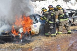 Several fire departments worked together to extinguish a car fire at the Grand Marais Fire Hall on Saturday, March 29. Firefighters with the Grand Marais, Maple Hill and Tofte fire departments worked together to not only put out one car on fire, but two. They also used extrication equipment on another wrecked car. What was the cause of the disaster? It actually wasn’t a disaster, it was training for the current students in the Firefighter I and II course. See more about the firefighter training on page A3.