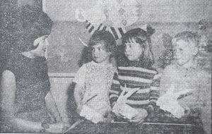 Easter bunnies made from empty egg cartons was a fun-time project for the Headstart class in Grand Marais in March 1969. Three of the participants, from left, are Jackie McLean, Susan Skrien and Stephen Forsberg, who are showing their bunnies to Mrs. Pius Lacher, instructor of the Headstart program at the former Bethlehem Church building.