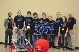 The Cook County High School Robotics team—Ice Storm 3054—created a talented robot for competition at the DECC in Duluth in March. Their robot, nicknamed Potato Salad, was able to toss the big red ball in the photo into a goal nearly seven feet off the ground. The robotics crew were (L-R) Instructor/mentor Sam West, Brandon Bockovich, Bergen Soland, Jacob Carr, Nate Carlson, Shae Morawitz, Cedar Adams, Klara McNeally, and mentor Rodney Carlson.