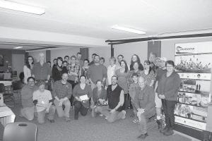 Although it is a competition, it is a friendly one. Everyone enjoys sampling the delicious varieties of chili at the Cook County Chili Cook-Off. And no one minded—too much—that Steve and Deb Veit, with help from Brandon and Amy Seitz, took first place. They are pictured in the middle of the front row with the Chili Cook-Off traveling trophy. The delectable chili and the hard work are for a good cause. Proceeds benefit the Coldwater Foundation, a nonprofit youth leadership program with an outdoor focus and the Violence Prevention Center’s educational programs.