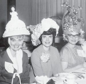 This delightful spring picture is shared by Diane Malner Merendo. The note accompanying the photos states that it was taken at the Hospital Auxiliary Hat Luncheon—but we like to think they are Easter bonnets. It is believed that the luncheon was in 1967. Diane remembers that the hat worn by her mom, Irene Malner, was a real cake! The talented hat makers are (L-R) Irene Malner, Jean Thomas, and Char Anderson.