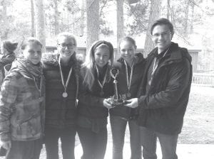 The 2014 Cook County High School Envirothon team members—Sophie Honeder, Aubry Lewis, Morgan Weyrens-Welch, Libby Zafft, and Andrew Thompson—celebrate their win. They advance to state competition on May 19.