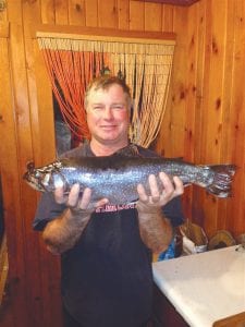 Dan Anderson of Grand Marais with the beautiful brook trout he caught on opening day of fishing season on the Brule River in Cook County. The fish was 23.5 inches long and weighed just under 6 pounds. This is definitely a native brook trout and will proudly be displayed on the wall of the Anderson home for many years to come.