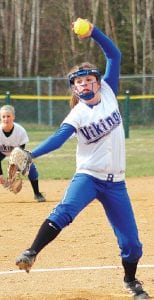 Far left: Sophomore pitcher Alex Slanga pitched a great game against Carlton in the playoffs. Above: Carrie Palmer backed up shortstop Hannah Toftey on this play. Toftey made the tag on the Silver Bay Mariner runner. Left: Abby Prom made a great catch on this low throw to first base.