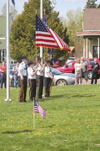 American Legion Post 413 conducted a Memorial Day ceremony on the Cook County courthouse lawn on Monday, May 26, honoring veterans who are no longer with us. Dozens of people gathered to pay their respects and to remember.