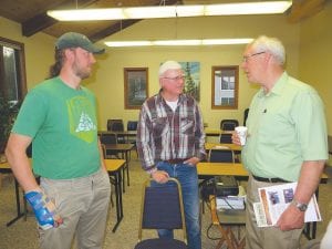 Howard Hedstrom (right) visits with his son, Jonathan (left) and friend Bob Pratt. Howard talked about the 100-year history of Hedstrom Lumber Company at Cook County Higher Education on May 27. Pratt worked for Hedstrom Lumber as a young man and Jonathan, an electrical engineer, is a fourth generation Hedstrom working for the company.