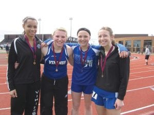 The Cook County Viking girls’ 4x400 relay team celebrates its great finish at the Subsection Meet at UMD on Wednesday, May 21. The team—Molly Thomas, Anna Carman, Sophie Eliasen, and Maya McHugh—cut 4 seconds off their time and came in at 6th place.