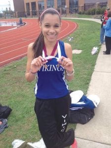 All smiles and showing off her medal, Molly Thomas nearly qualified for the state track meet with her 4th place finish at Sections. Molly, a 9th grader, ran 63 seconds and change for the quarter mile, less than 2 seconds back of the second place finisher.