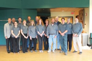 The Arrowhead Cooperative crew—or most of it, that is. Newly reelected Director Keck Melby is not pictured. (L-R) Acting General Manager Joe Buttweiler, Director Les Edinger, Accounts Representative Sara McManus, Director Mike Littfin, Accounts Representative Molly Wickwire, Lineman Brian Schroeder, Customer Service Representative Sandy Petty, Operations Manager John Twiest, Administrative Assistant Kari Carter, Operations Assistant Rose Thoreson, Lineman Donald Sorlie, Director Tom Spence, Engineering Technician Steve Waver, Director Sharon Bloomquist, Director Howard Abrahamson. (Not pictured Financial & Administration Manager Jenny Kartes, Lineman Jerry Paine, Lineman Aaron Sjogren, Right of Way Technician Mickey Brazell, Communications Lineman Andrew Strand and Directors Scott Harrison and Keck Melby.)