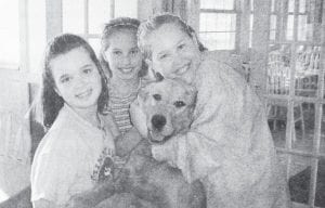 These caring young ladies, featured in the April 9, 2011 Cook County Star, were jewelry makers with a heart. Under the “company name” Smaug’s Jewels, the girls made and sold jewelry as a fundraiser for children with cancer. (L-R) Marie Nordahl, Kristin Bond and Brianna Houglum (hugging Marie’s puppy, Honey). As the story of their kindness went to press, they had raised $241.18.