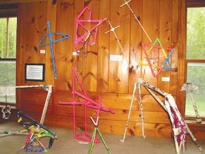 After six weeks of gathering to create art, 13 artists ranging in age from 5 to 12 years presented their work in an art show at the Hovland Town Hall on Sunday, June 1. Left: Kids created novel sculptures. Above: A number of colorful clowns were part of the 120-piece display.