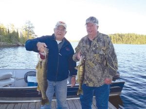 Sagonto Resort had a celebrity of sorts fishing there last week—Leroy Chiovitte. Chiovitte (pronounced shi-vah’-tee) has held the record for the state record walleye since 1979. His record catch weighed in at 17 pounds 8 ounces. He caught the state record walleye with his fishing partner, Lorin Palmer, who also joined him on his recent visit to Sagonto. The men had another fabulous day of fishing on Lake Saganaga on June 10. Chiovitte, 76, of Hermantown and Lorin Palmer, 78, of White Bear Lake, Minnesota are holding the 31-inch and 21-inch walleyes caught on June 10. Marco Manzo III of Sagonto Resort noted “Leroy is one of the few who can call a 31-inch walleye a ‘baby.’”