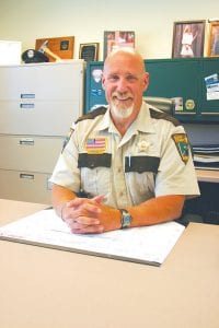 With 13 days to go until retirement, Mark Falk has every reason to smile. The Cook County sherirff is calling it quits after 27 years in law enforcement. Falk's immediate future plans include riding his Harley, running trails, and helping his wife in her daycare business.