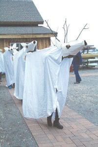 The 2014 Wooden Boat Show includes the fantastical Summer Solstice Pageant on Saturday evening, June 21. This year’s production was Funology, a play on the study of nature (phenology), which featured a delightful assortment of animals. Above: The audience was delighted by the appearance of a herd of caribou.