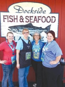 What do doctors say about fish being good for one’s health? Must be true because several Dockside Fish Market employees competed in the Garry Bjorklund half marathon (13.1 miles) on Saturday, June 21, finishing with tired legs but big smiles. (L-R) Michaela Bucheit, Lynn Mackey (Lynn ran the William A. Irvin 5K), Shelly Norman, and Amanda Anderson. (Not pictured: Dockside crewmember Bill Simonowicz.)