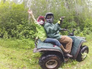 This dad and daughter were all smiles under those helmets as they enjoyed the ride.