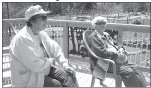 The Cook County Senior Center recently had a day of fun at the Putt & Pets mini golf course in Grand Marais. Above: Betty Wilson and Jean Kloster relaxing on the deck during the Senior Center’s latest “mystery trip.