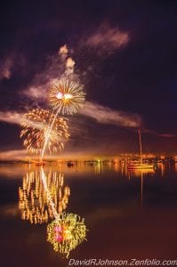 Although the crowd had to take cover from scattered rain showers, the fireworks went on in Grand Marais, Grand Portage and Tofte. David Johnson of Grand Marais caught this fiery burst over the Grand Marais harbor. See more 4th of July photos inside.