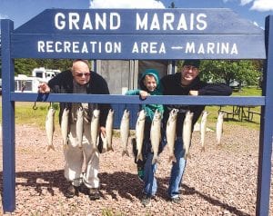 Paul Anderson of Grand Marais and friends had a great day on Lake Superior with Captain Jerry Skarupa of Secret Lures. They caught a feast of lake trout. (L-R) Paul Anderson, Warren Strootman, Bob Strootman.