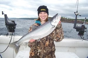 Emily Meyer from Deer River, Minnesota caught this 10-pound lake trout while fishing on Lake Superior with Captain Darren Peck of Tofte Charters on Tuesday, July 1.