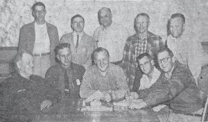 This photo of the Fisherman’s Picnic organizers (sometimes referred to as the “brain trust”) appeared in the June 6, 1957 issue of the Cook County News-Herald. The caption tells us: At a May 24 meeting of the Lions Club Committee, the date for the Fisherman’s Picnic was changed from the first week in August to August 8, 9, 10 and 11. The reason for the change was that the first days in August conflicted with the Fort William Centennial celebration. The committee is (L-R, back) Wesley Hedstrom, Ed Humphrey, Ted Wynn, Frank Lehto, Jim Pedersen. (L-R, front) Emil Hall, John M. Blackwell, Alton Olson, Harold Norby, Chuck Futterer. Futterer and Norby are the co-chairmen of the picnic.