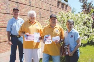 The local veterans who took part in the June 2014 Northland Honor Flight visited the memorials honoring our nation’s veterans in Washington, D.C. Above: (Staff photo/ Rhonda Silence) One of the nicest things about the Honor Flight is the “mail” that veterans receive on the flight. This year’s trip participants were guardian Orvis Lunke, veteran Lenny Sobanja, veteran Dave Palmer, guardian Penny Schuppel. The veterans are showing some of the mail they received. Schuppel, Dave Palmer’s daughter, shares the album she put together about her dad’s naval service and the Honor Flight. Left: (Photo by Penny Schuppel) They also enjoyed meeting some active duty service people—and this paratrooper—who visited with Dave Palmer about military aircraft through the years.