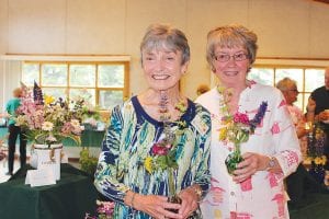 Kay Sartorius and Ginny Storlie were honored for their 25 years of membership in the West End Garden Club. The women thanked their fellow members for the honor—and the many years of friendship.