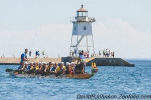 For the 11th year, dragons overtook the Grand Marais harbor during the North Shore Dragon Boat Festival. The festival held July 25-27, 2014 included some exciting race action. Wiki and the Boys of Duluth were the top finishers for the day, earning the Palladium Championship trophy. Looking at the synchronized paddles as they headed to the starting line, you can see why. See more Dragon Boat Festival festivities on page A3.