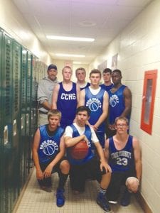 Participating in the University of Wisconsin-Superior basketball league this summer were (L-R, front) Mike Burton, Jared Spry, Colton Furlong. (L-R, back) Coach Pat Eliasen, Lars Scannell, Jamie Wick, Rory Bakke, Andy Farley and Sam O’Phelan.