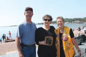 Lion Rosemary Lamson (right) coordinates the Citizen of the Year awards each year. She was happy to present the Senior Citizen of the Year Award to Orvis and Donna Lunke of Colvill.