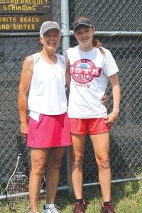 Kathy Bolstad (left) of Grand Marais and Sarah Ismail of Midland, Michigan were the 2014 Fisherman’s Picnic Tournament women’s Open Doubles champions.