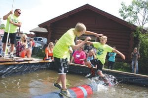 Luke Johnson was a bit too quick on this log, rolling the fleet-footed Dominic Magnone into the drink. Johnson finished second in the U-13 boy’s division of the Minnesota State Championships.