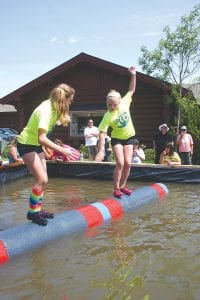 Sophie Eliasen (right) paid close attention to the feet of her competitor, Emma Magnone in the girls' U-13 championship match. Emma beat Sophie 3-2 to take the title in a very exciting contest of two evenly matched rollers.