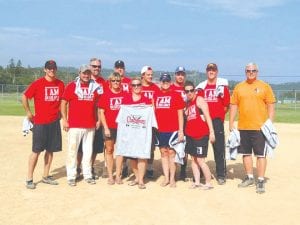 The Big Red Army was the champion in the Grand Portage Rendezvous Days Softball Tournament. The team is (L-R) Kurt Steele, Chris Smith, Mike Christianson, Debbie Bakke, John Macgillavray (behind), Cindi Crawford, Kale Boomer, Hilja Iverson, Colin Everson, Sara McAteer, Dylan Quaife, Charles Christianson.