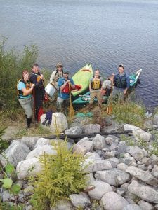 Beginning mid-June the six-person team of (left to right) Tessa Olson, Alex Compton, Adam Maxwell, Ryan Ritter, Kari Smerud, and Jake Bendel paddled/portaged 907 miles on nine river systems north to the Hudson Bay community of Whales Cove, arriving there on August 11. Maxwell, Bendel and Olson are all former employees of Voyageur Canoe Outfitters.