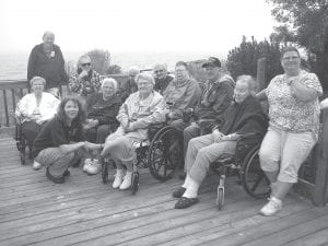 Residents of the North Shore Care Center enjoyed a recent visit to the Cook County Historical Society Lighthouse Museum. It was a great day to sit on the deck, eat fresh donuts, and appreciate the view. Dori Betts presented information about the Way of the Waters exhibit and showed an impressive documentary about the ship America. (L-R, front) Joyce Kehoe, Kay Rosenthal, Bernice LeGarde, Jane Backstrom, Janet Morgan, Nora Bockovich. (L-R, back) Belinda Hudler, Dave Asproth, Bob Heideman, Skip Rouser, Esther and Don Sorlie.