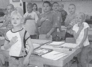 Sawtooth Elementary third-graders “took the pledge” on the first day of school in 2003. Shown reciting the Pledge of Allegiance in this Sept. 5, 2003 News-Herald photo are, front, Alex Olfson; second row from left, Sarissa Falk, Kale Boomer, Justin Goldstein and Signe Larson; and third row from left, Kaely Danielson, Mike Taylor, Tanner Tibodeau and Gunnar Cronberg. Enrollment at the Grand Marais elementary school in 2003 was 261; there were 171 middle schoolers and 199 high school students – 43 of whom were seniors.