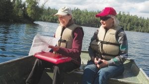 Participants in the Healthy Shorelands workshop on Wednesday, August 27 toured a shoreline by boat to discuss why some shorelands were healthy for the lake’s ecosystem and others were not.