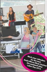 Above: Fresh from the kids’ tent, with painted faces and colorful ribbons, these young ladies danced to the music of Joe Paulik and Friends. Right: Joining the fun was Max, jamming along on his little guitar.