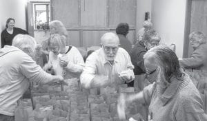 Members of Spirit of the Wilderness gathered recently to fill bags for The Cupboard, providing hygiene items for young people whose families may not be able to purchase the necessary supplies.