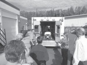 Ambulance Director Steve DuChien shows off a newly refurbished ambulance (1 of 3) to the hospital board, pointing out a new diagnostic tool that can determine what kind of heart attack a person is having and send results to the hospital (when there is a signal) in 11 seconds. Ambulance crews are busier than ever and are on pace to complete 450 runs this year, which would be an all-time record, said DuChien.