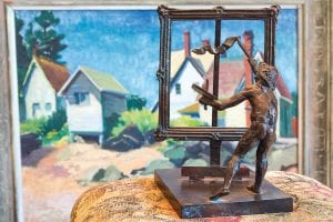 Paul Granlund, the North Shore artist who created The Swimmers at the Johnson Heritage Post also created this small sculpture. It is a depiction of Art Colony founder Birney Quick painting—in front of a painting by Quick. This highlights two extraordinary artists you will see showcased in the Grand Marais Art Colony Tour D’Art.