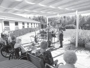 The first day of fall was a real treat for residents at the North Shore Care Center. Our beautiful warm weather allowed for an outdoor concert with old time country and gospel music performed by the Flute Reed Ramblers. Everyone enjoyed lemonade in the shade! The Flute Reed Ramblers are a family band from Hovland including John Redshaw on banjo, Kristen Caarlsgaard on fiddle, and 8-year-old Martine Redshaw on guitar.